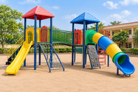 Illustrative outdoor multiplay station for children in a sunny school play yard